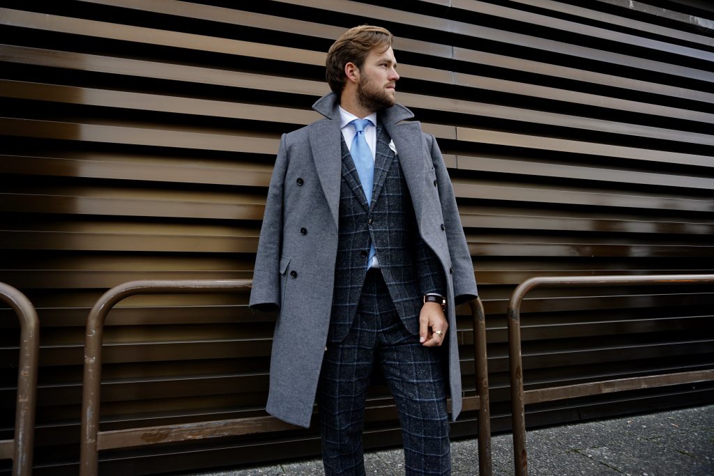 Pitti uomo checkered suit blue tie trench coat style man